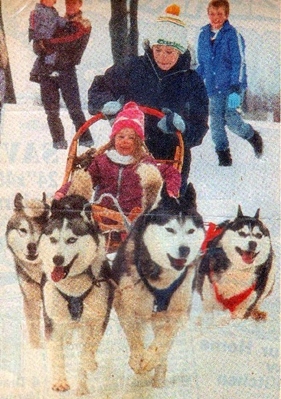 Kyle Broadhurst running the sled dog rides  at the Valens Conservation Area for the "Old Fashion Ice Cutting Bee"